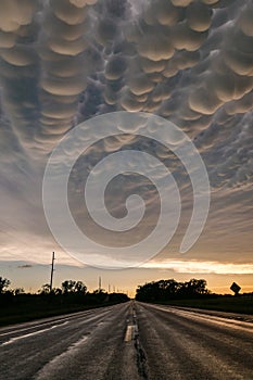 Amazing mammatus clouds over the road at the back of a severe thunderstorm over Nebraska