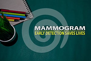 Mammogram - Early Detection Saves Lives Text on Table Green Background