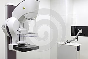 A mammogram machine with a computer work station in the radiology department