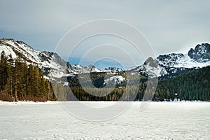 Mammoth mountain during winter. the frozen lake cover with snow