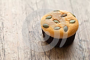 Mamon cake or cupcake on wooden desk background photo