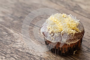 Mamon cake or cupcake on wooden desk background photo