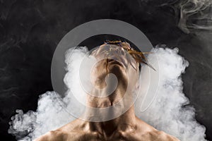 A man in abstract smoke