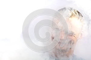 A man in abstract smoke