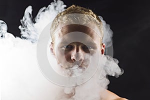 A man in abstract smoke