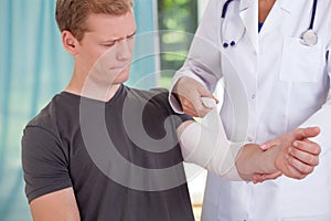 Man with aching hand photo