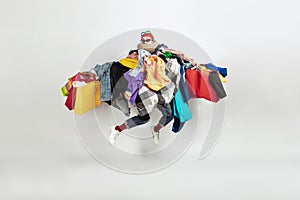 Man addicted of sales and clothes, overproduction and crazy demand