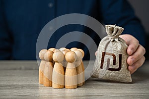 Man adjusts an Israeli shekel money bag to a crowd of people figurines.