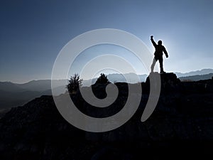 the man with adventure on his compass and boldly advancing to the goal photo