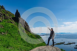 Man adventurer Norway Travel hiking lifestyle concept active weekend summer vacations