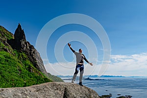 Man adventurer Norway Travel hiking lifestyle concept active weekend summer vacations