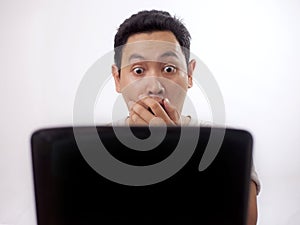 Man Afraid When Looking at Laptop