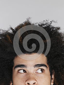 Man With Afro Hairdo Looking Sideways