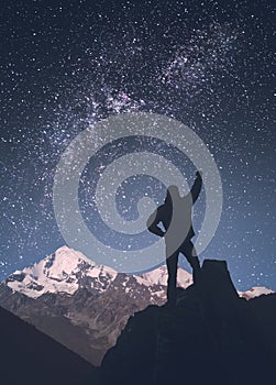 Man against milky way in a starry sky. Instagram stylization