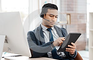 Man, agent and call centre or working with tablet, crm and telemarketing with sales consultant. Support, help desk and