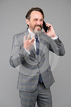 Man aggressive man talking mobile phone, revenge concept