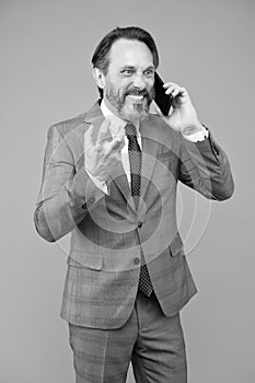 Man aggressive man talking mobile phone, revenge concept