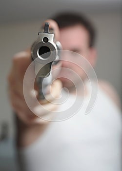 Man Aiming Gun