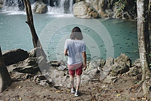 Man alone at the waterfall