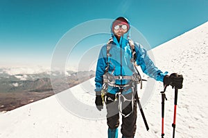 Man alpinist mountain climbing photo