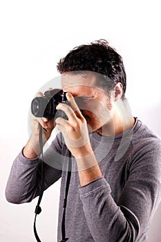 Man with analogic camera photo
