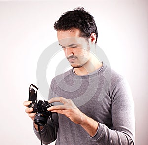 Man with analogic camera photo