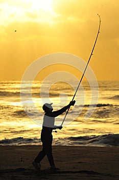 Man Angling in the Dawn photo