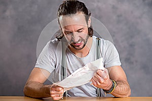 Man is annoyed about a letter
