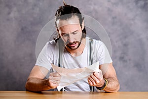 Man is annoyed about a letter