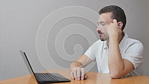 Man in anticipation about notebook