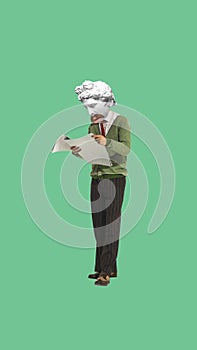 Man with an antique statue bust standing and reading a newspaper. Contemporary art collage. Interest and curiosity