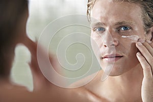 Man Applying Facial Cream