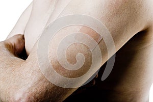 Man arm with nicotine patch
