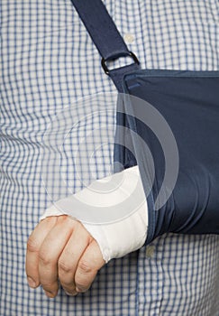 Man with arm in sling