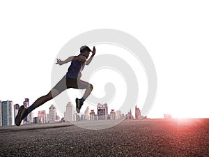 A man as athlete runner in high speed running action on the road