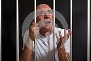 Man asking for mercy in prison