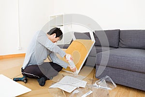 Man assembling table