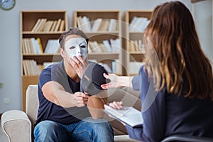 The man attending psychology therapy session with doctor