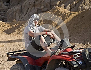 Man on ATV in desert