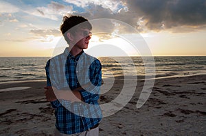 Man With Aviators on Beach photo