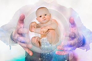 Man with baby between his hands - clone concept