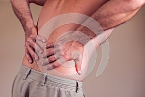 Man with back pain. People, health care, medicine concept