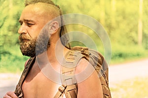 Man with backpack against nature background