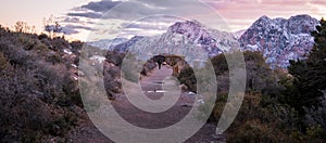 A Man backpack in the Redrock Canyon National Park with snow and