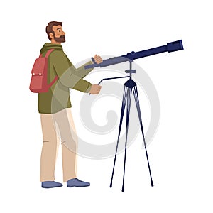 Man with backpack using telescope