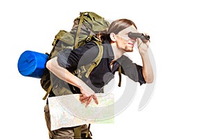 Man backpacker with map looking through binoculars