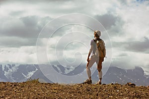 Man backpacker mountains concept