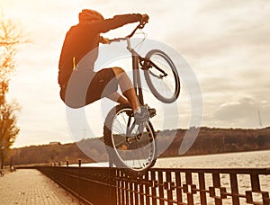 Man balancing on handrail