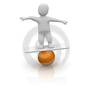 Man balancing on orange ball photo