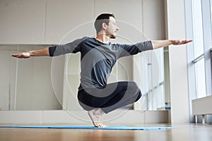 Man balancing on toes